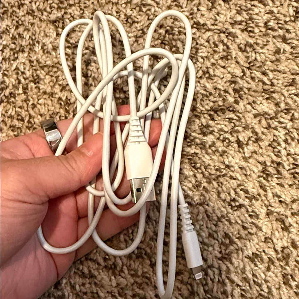 3 USB-A to Lightening Charging cables and one Apple charger block